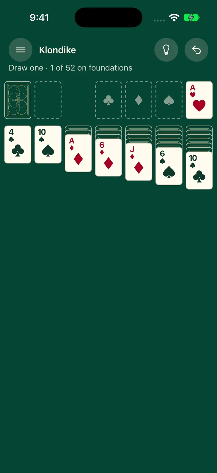 Actual Time for Cards Klondike table with ivory playing cards on green felt